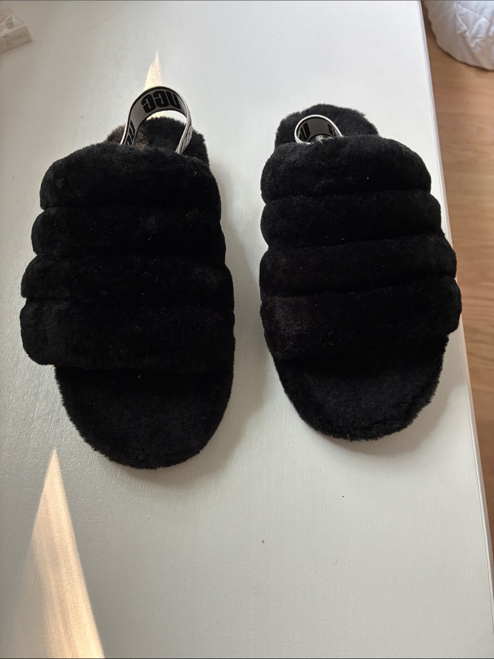 UGG Black Fuzzy Slide Slippers with Logo Sling